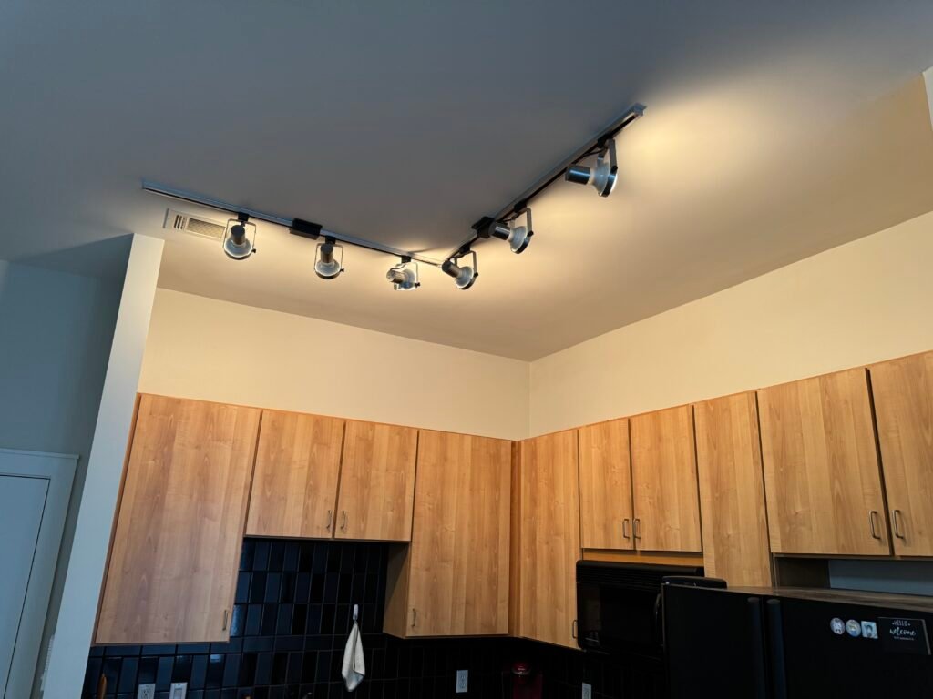 Javi’s TV Mounting & Handyman Services installing ceiling lights in a Louisville kitchen