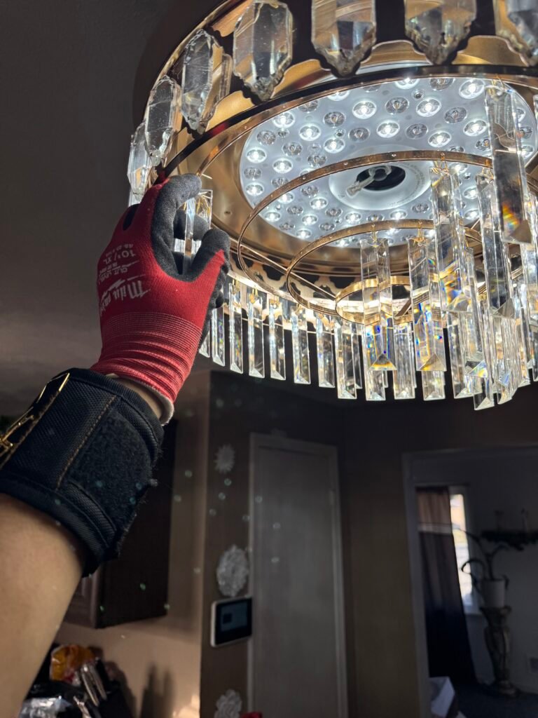 Modern chandelier installed by Javi with clean and secure mounting