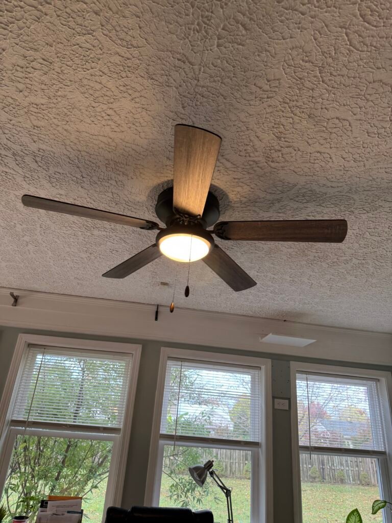 Removing and upgrading ceiling fan for better airflow and lighting