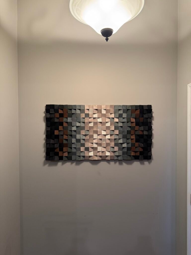 Heavy picture hanging securely installed on wall in Louisville KY