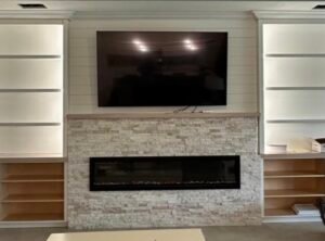 Custom media wall installation in Louisville KY with TV and built-in features