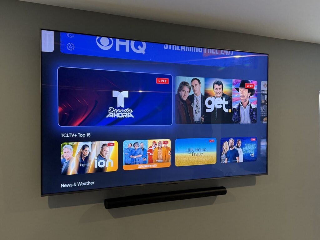 TV and Soundbar Mounting in Louisville, KY 98-inch TCL TV with Sonos Arc Ultra centered below it on a gray wall in Fisherville, Kentucky