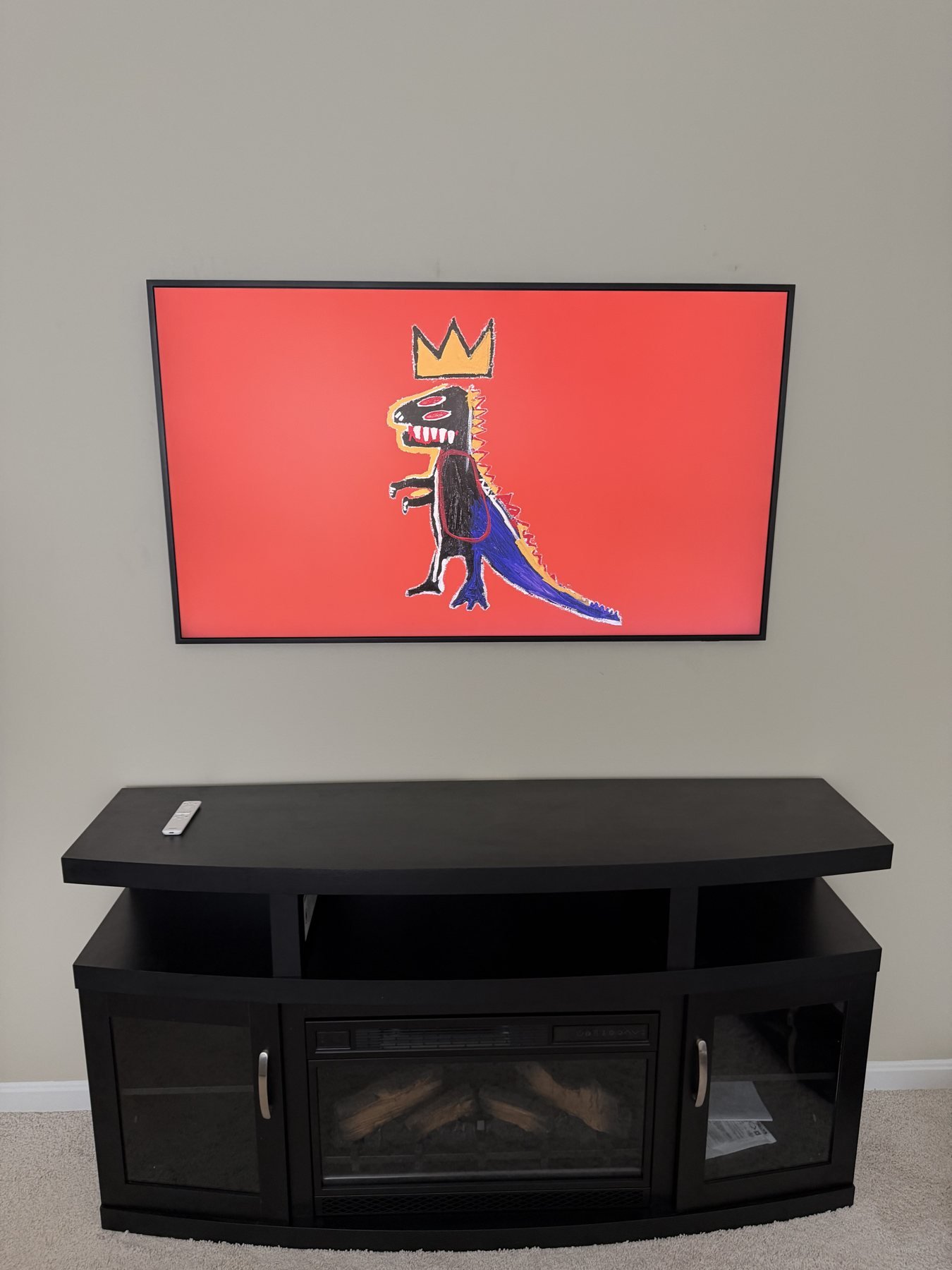 Fisherville Samsung Frame Above a Fireplace Media Console Samsung Frame TV on a painted wall above a black electric-fireplace media cabinet in Fisherville, Kentucky