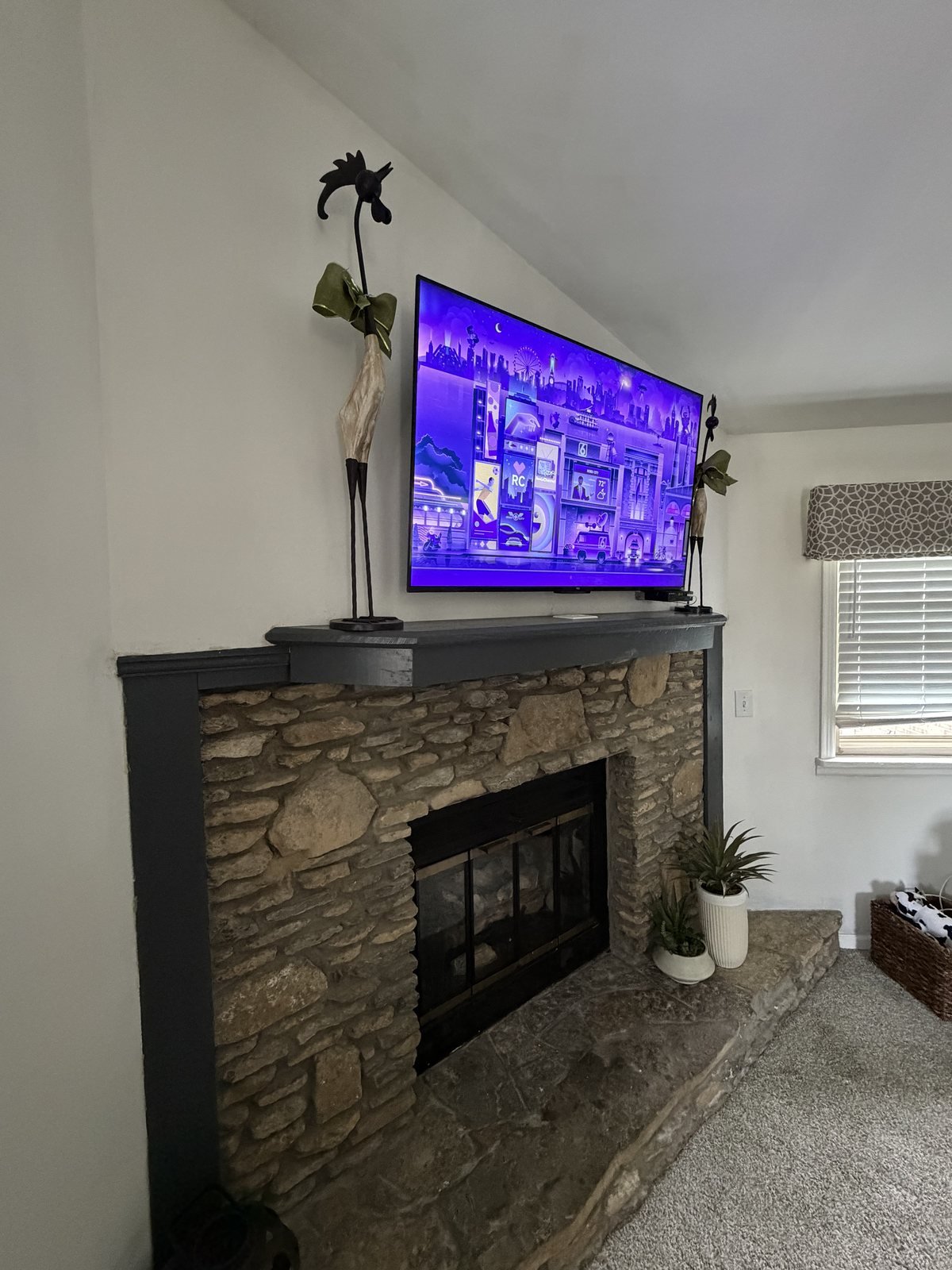 TV Mounting in Jeffersontown, KY TV mounted above a stone faced fireplace in Jeffersontown, Kentucky